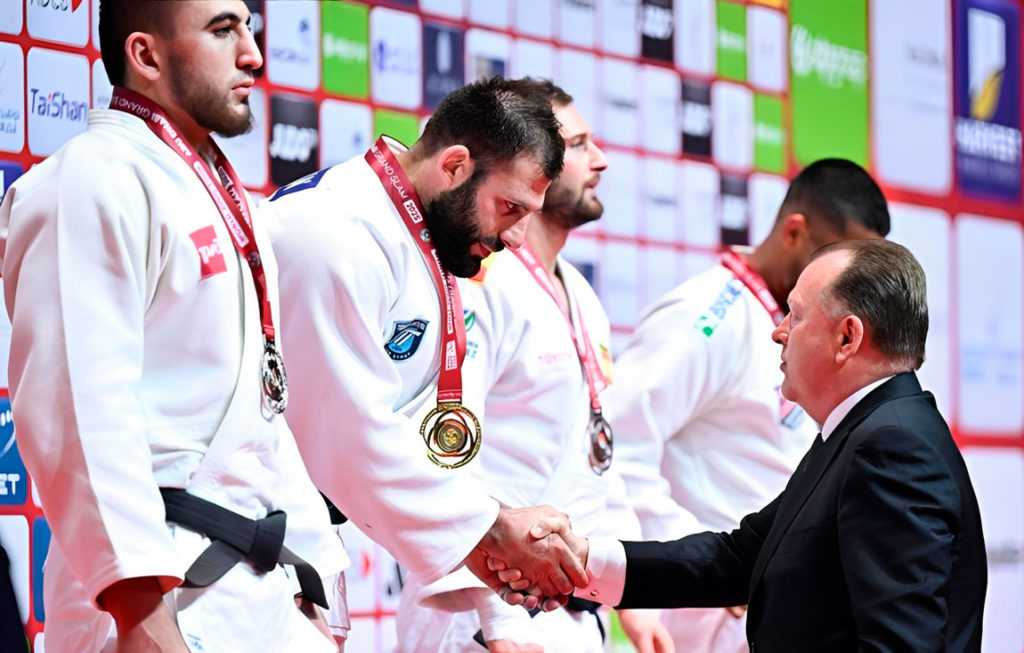 Can athletes compete in both judo and karate at the same tournament?